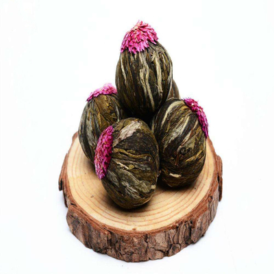 L'OEM 100% handcrafted de beaux différents genres de floraison de thé de boule de thé de floraison